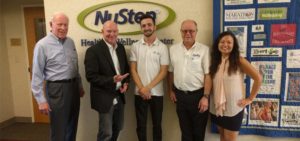 Mobility-Aids-Centre-staff-stood-at-NuStep-HQ-with-NuStep-staff